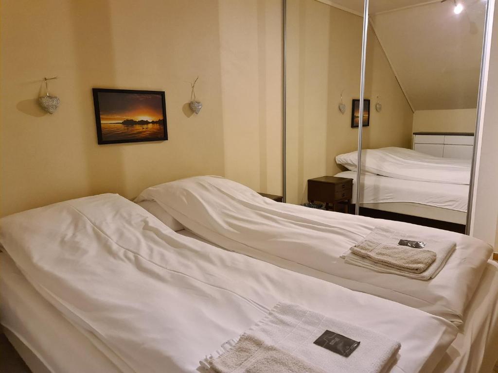 Postel nebo postele na pokoji v ubytování Skeisvang Gjestgiveri