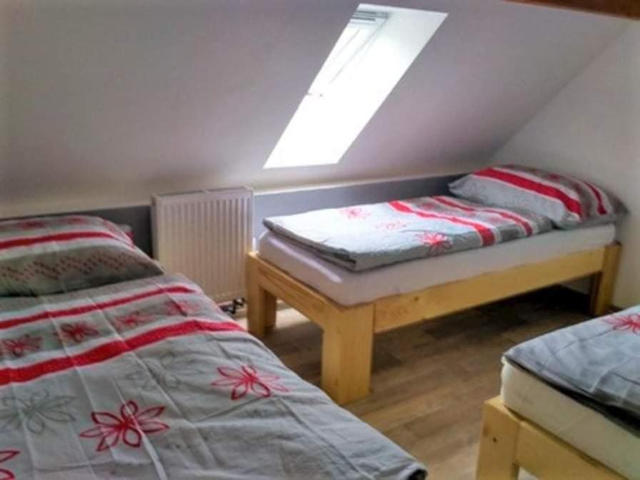 Postel nebo postele na pokoji v ubytování Apartmán Natálie v Zaječí
