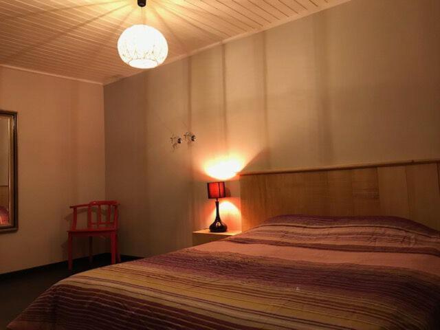 Postel nebo postele na pokoji v ubytování Gite Maison Alfred Soussigne