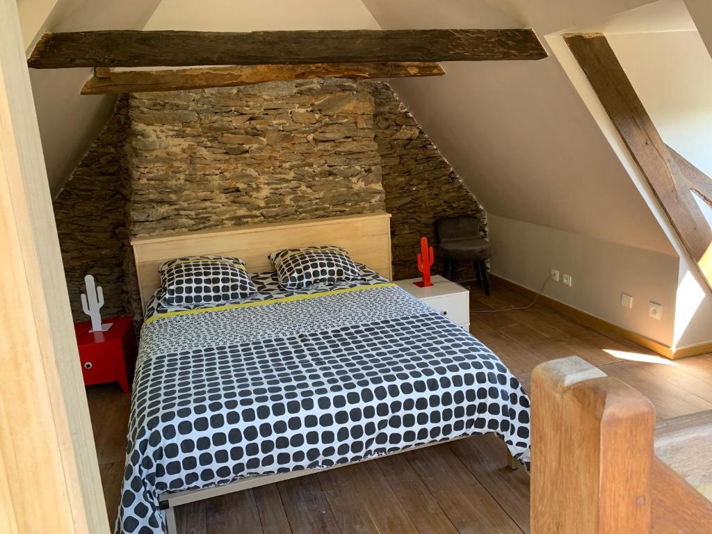 Ένα ή περισσότερα κρεβάτια σε δωμάτιο στο Maison d'Hélène