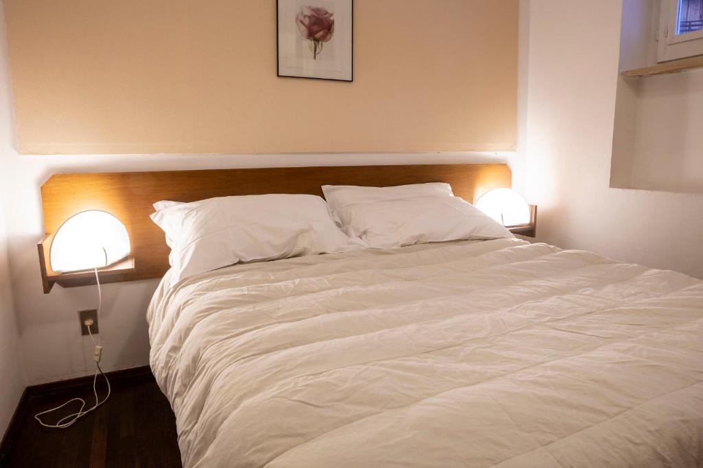 Postel nebo postele na pokoji v ubytování Hotel Hermitage