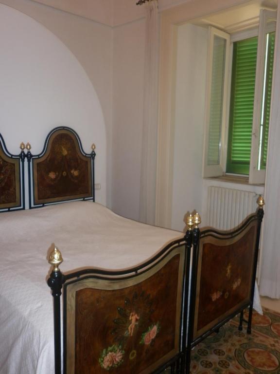 Łóżko lub łóżka w pokoju w obiekcie Lilla B&B