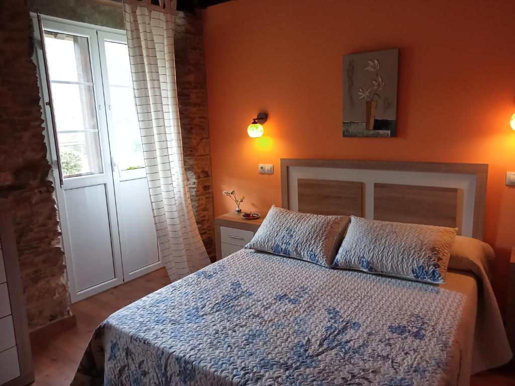 Postel nebo postele na pokoji v ubytování A Casa das Augas