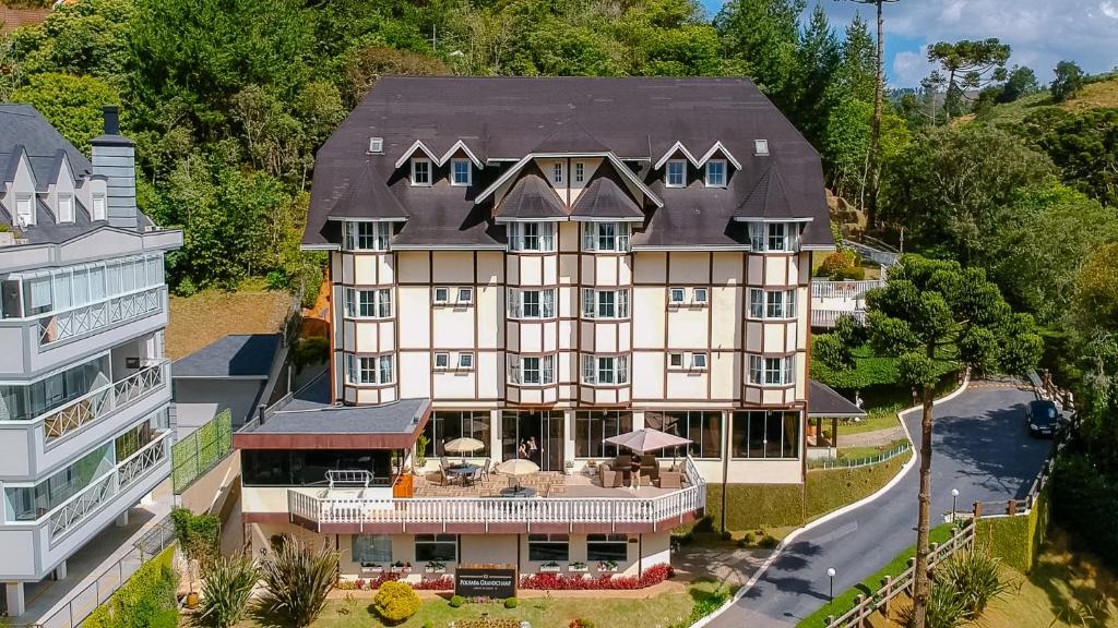 an aerial view of a large house at Pousada Grandchamp - Campos do Jordao in Campos do Jordão