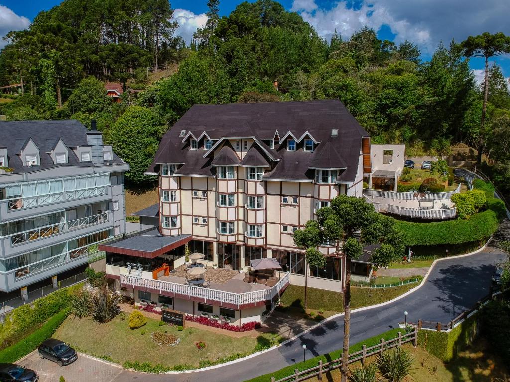 an aerial view of a large house at Pousada Grandchamp - Campos do Jordao in Campos do Jordão