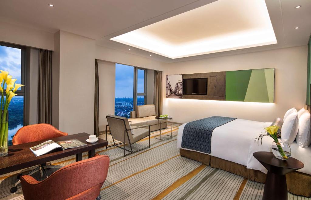 Postel nebo postele na pokoji v ubytování Radisson Blu Shanghai Pudong Jinqiao
