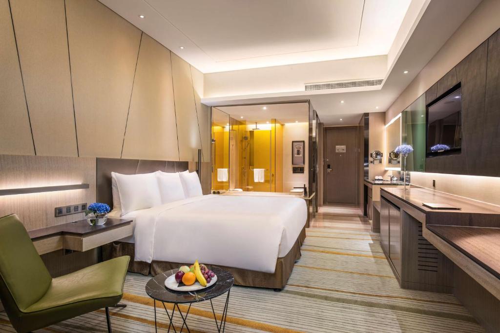 TV a/nebo společenská místnost v ubytování Radisson Blu Shanghai Pudong Jinqiao
