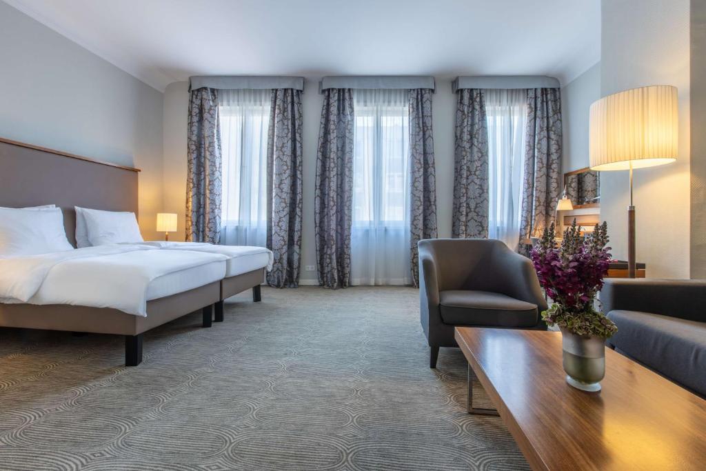Postel nebo postele na pokoji v ubytování Radisson Blu Hotel Schwarzer Bock Wiesbaden