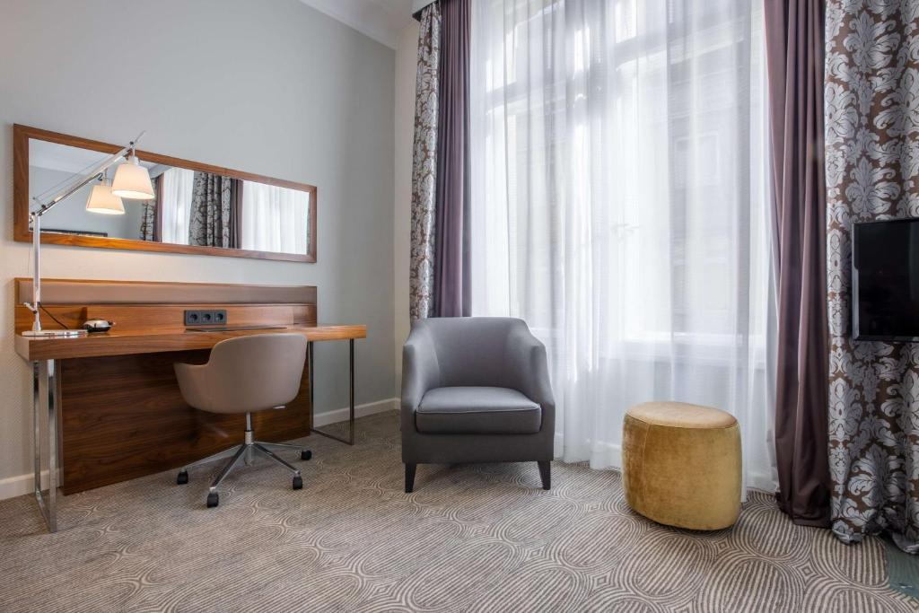 TV a/nebo společenská místnost v ubytování Radisson Blu Hotel Schwarzer Bock Wiesbaden