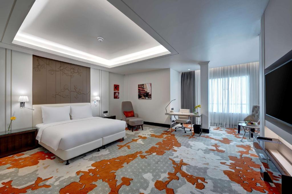 TV a/nebo společenská místnost v ubytování Radisson Blu Hotel, Ajman