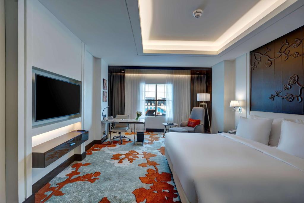 Postel nebo postele na pokoji v ubytování Radisson Blu Hotel, Ajman