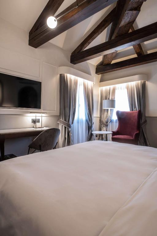 Voodi või voodid majutusasutuse Radisson Collection Hotel, Palazzo Nani Venice toas
