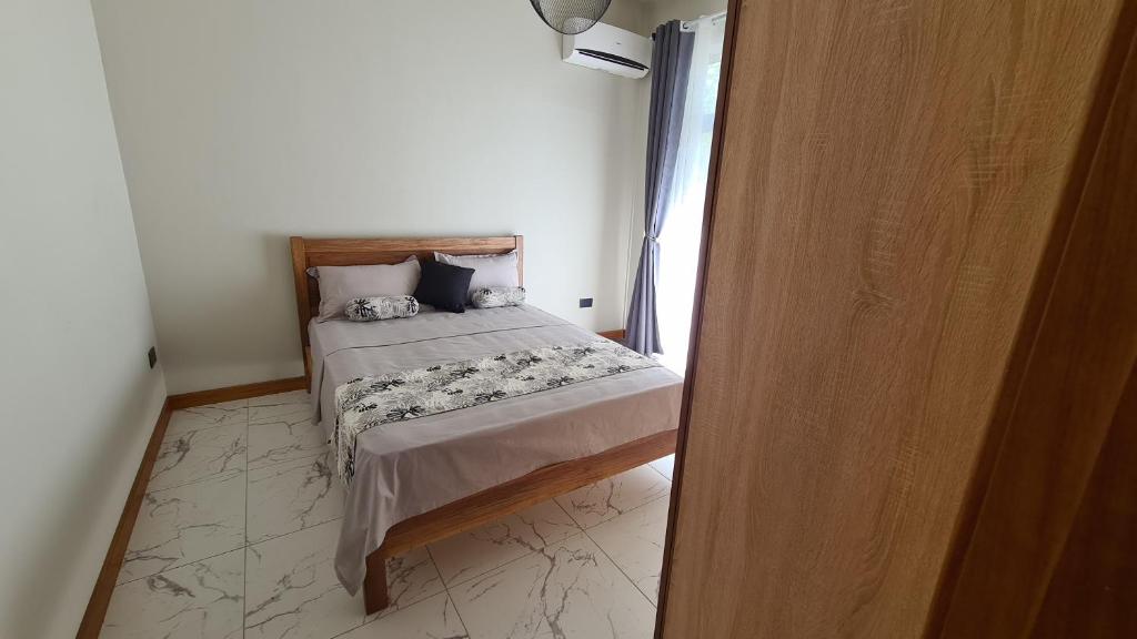 Postel nebo postele na pokoji v ubytování Laolabaone
