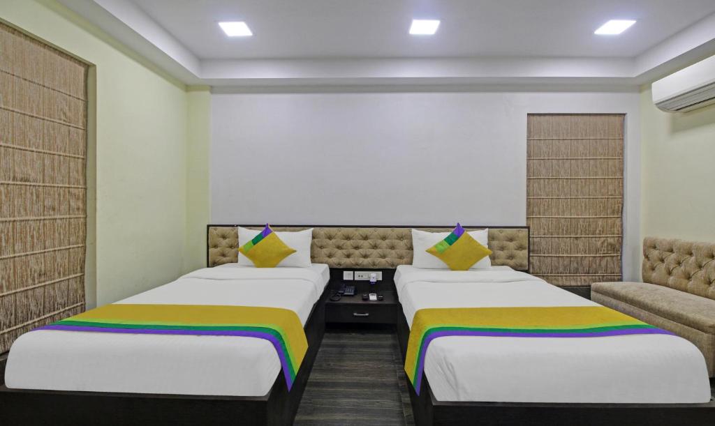 Postel nebo postele na pokoji v ubytování Itsy Hotels Reotel