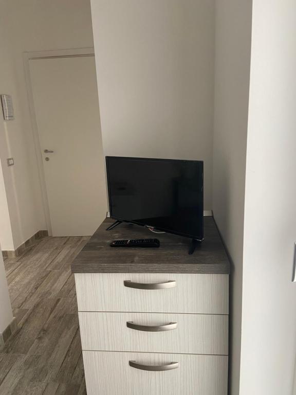 A television and/or entertainment centre at Room27
