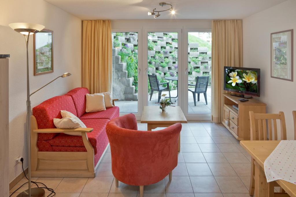 TV a/nebo společenská místnost v ubytování Casa Collinetta