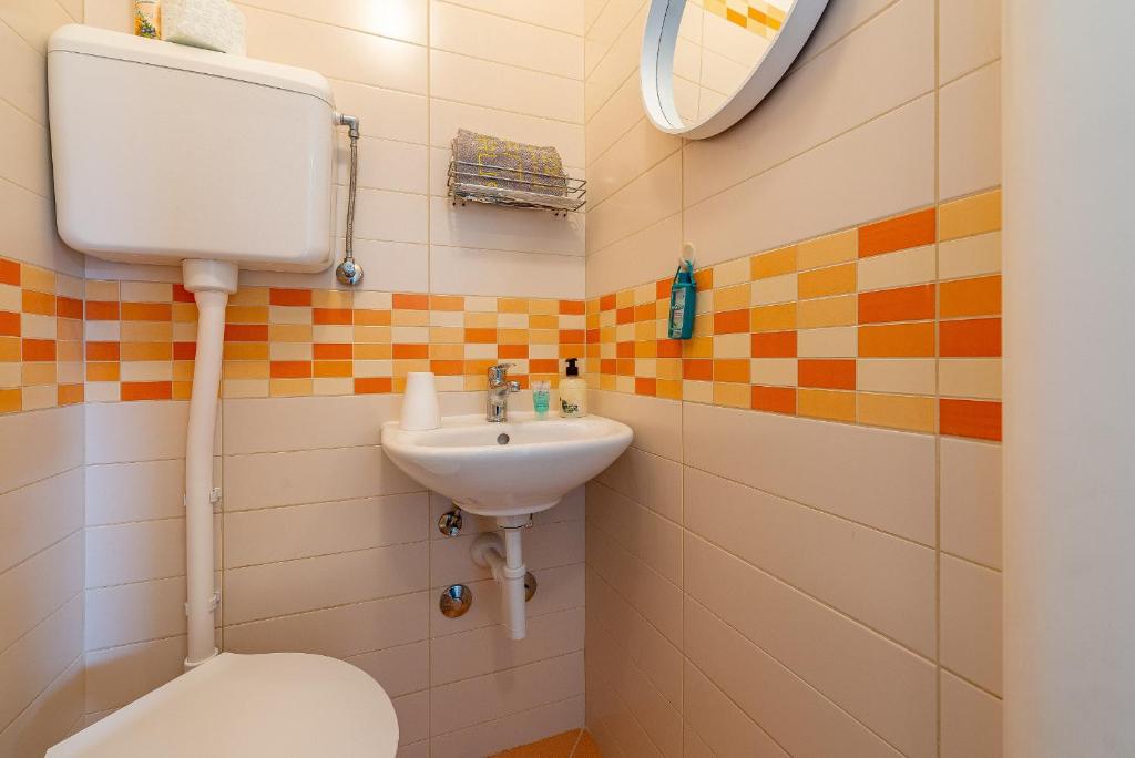 Kúpeľňa v ubytovaní Apartments Roje