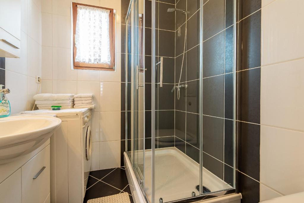 Kúpeľňa v ubytovaní Apartments Roje
