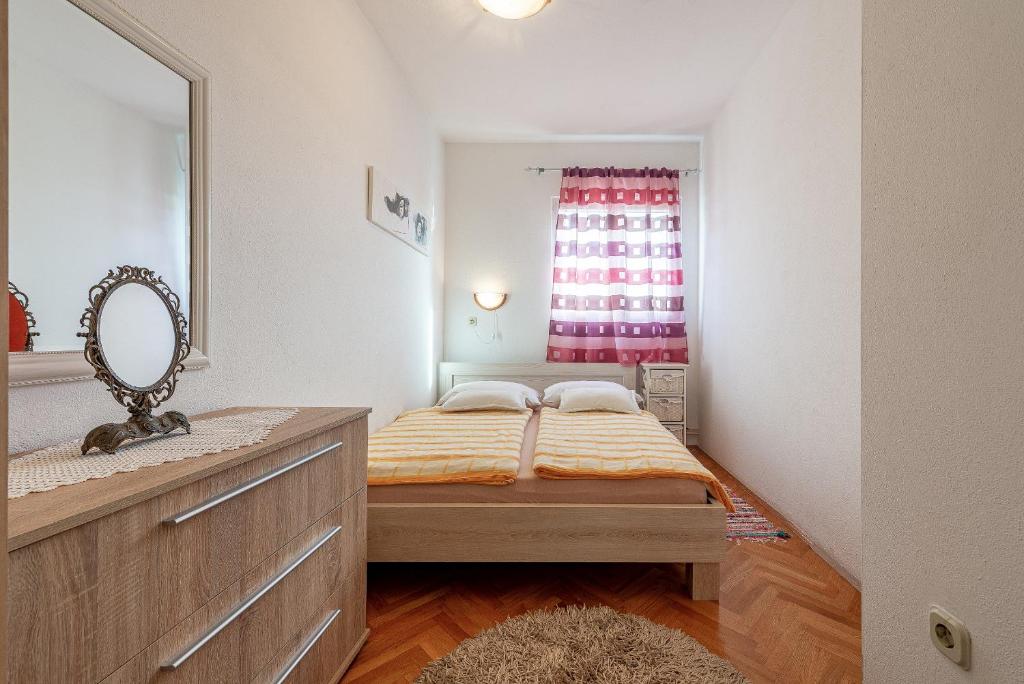 Posteľ alebo postele v izbe v ubytovaní Apartments Roje