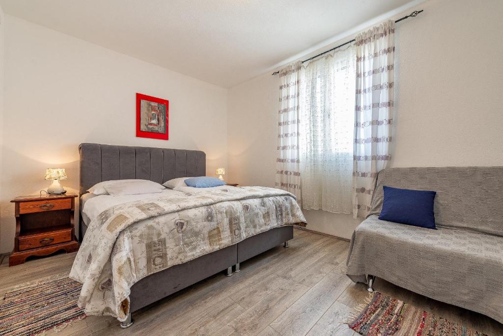 Posteľ alebo postele v izbe v ubytovaní Apartments Roje