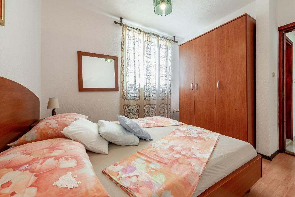 Posteľ alebo postele v izbe v ubytovaní Apartments Roje