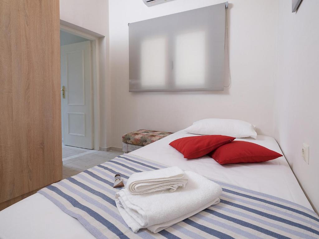 A bed or beds in a room at The Museum View Suite