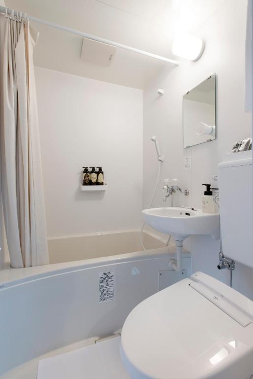 Koupelna v ubytování Hotel Kojan