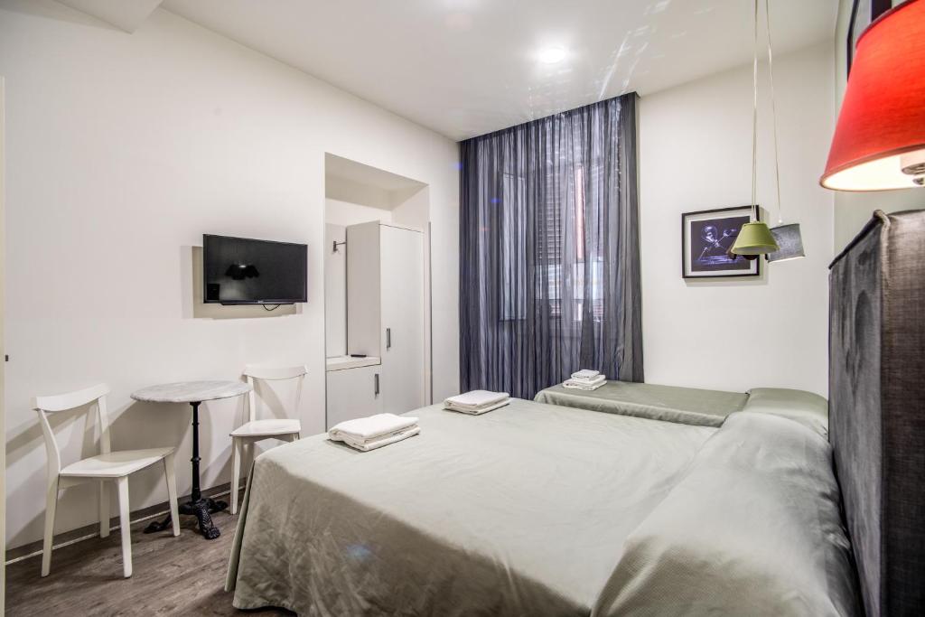 Postel nebo postele na pokoji v ubytování Hotel Seiler