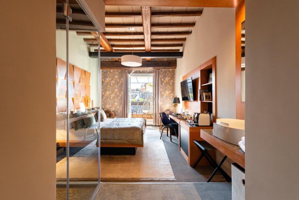 A bed or beds in a room at Ara di Marte Suites