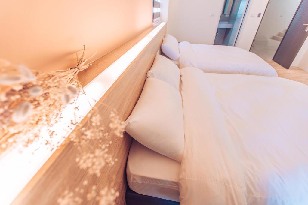 Postel nebo postele na pokoji v ubytování The Pai Hotel