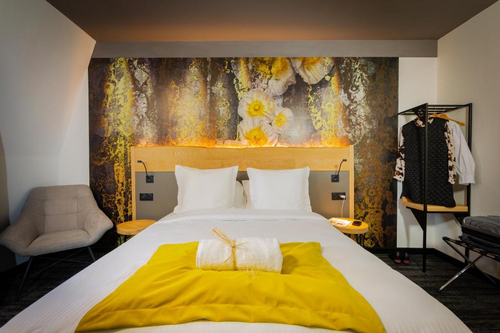 Postel nebo postele na pokoji v ubytování Berti Hotel - Mulhouse Centre Gare