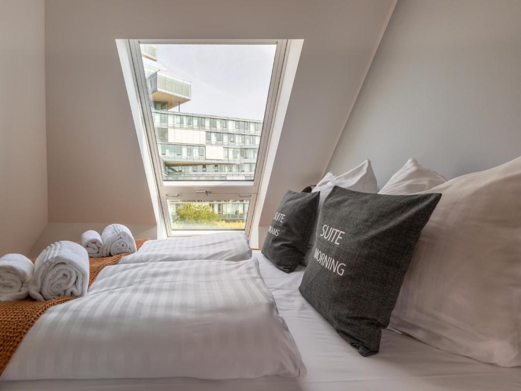 Postel nebo postele na pokoji v ubytování limehome Hannover Bleichenstraße - Digital Access