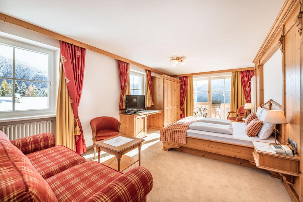 Postel nebo postele na pokoji v ubytování Hotel Scherlin