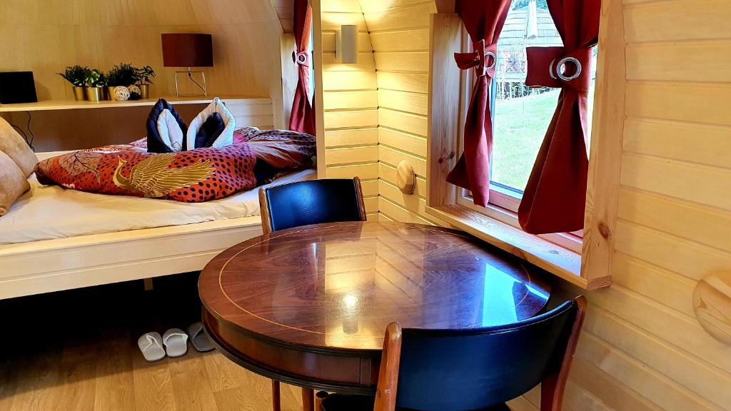 Postel nebo postele na pokoji v ubytování les Refuges du Chalet