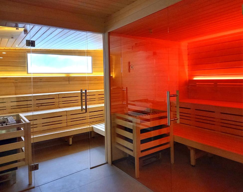 Palanda nebo palandy na pokoji v ubytování Living Hotel Kaiser Franz Joseph