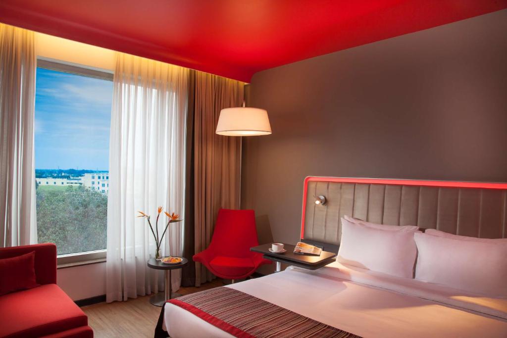 Postel nebo postele na pokoji v ubytování Park Inn By Radisson Gurgaon Bilaspur