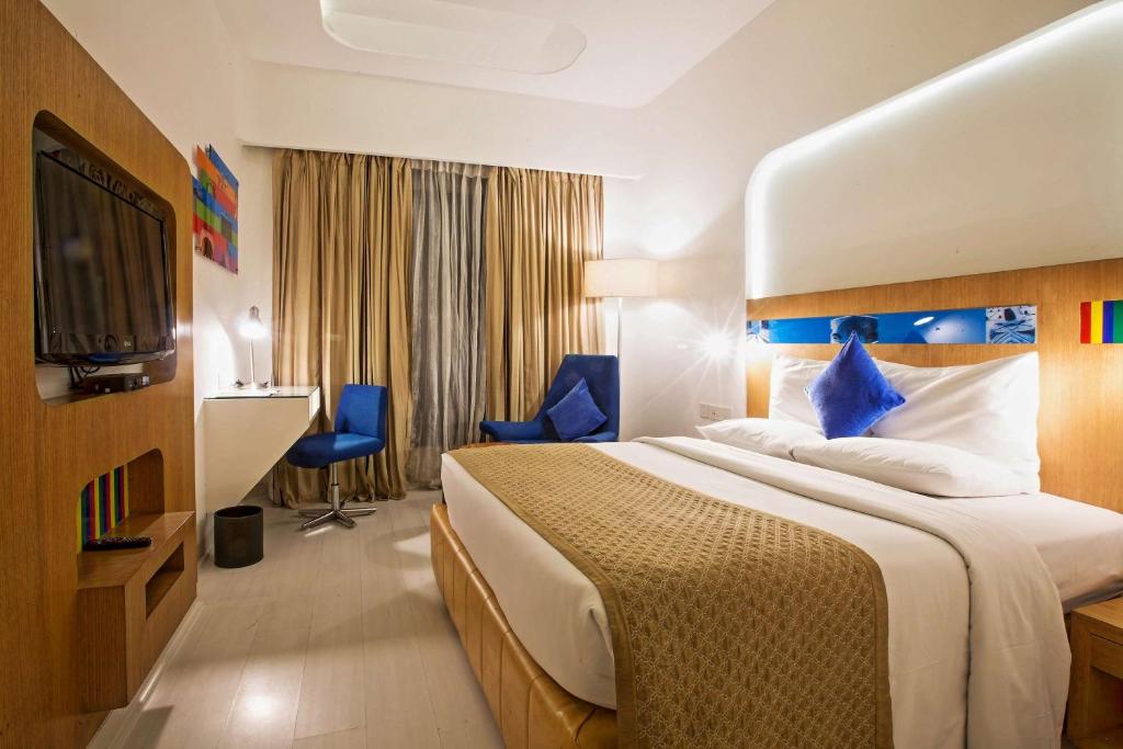 Postel nebo postele na pokoji v ubytování Park Inn by Radisson New Delhi IP Extension
