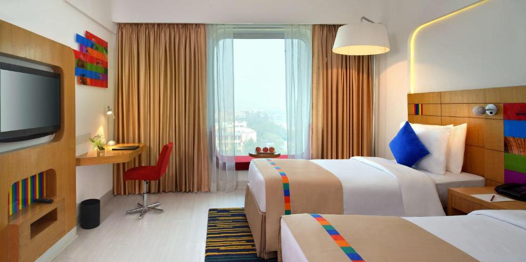 Postel nebo postele na pokoji v ubytování Park Inn by Radisson New Delhi IP Extension
