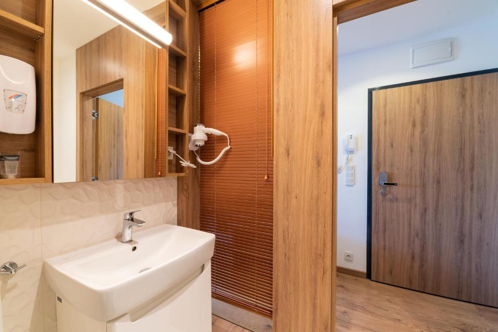 Kúpeľňa v ubytovaní Wolska Suits
