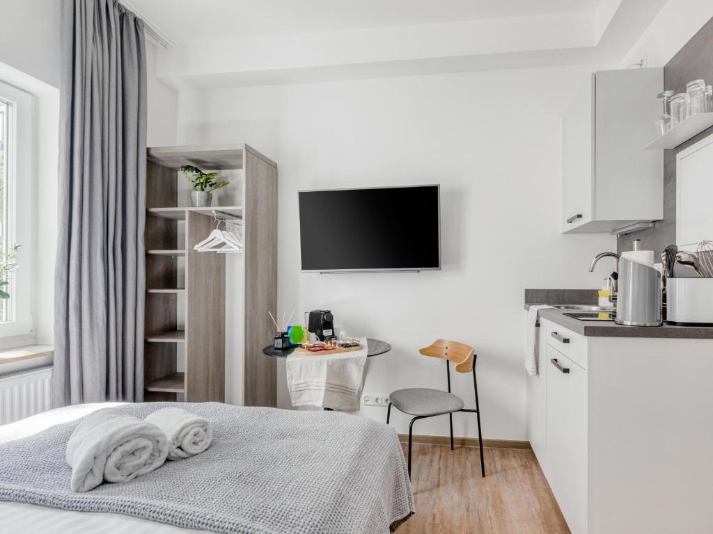 Kuchyň nebo kuchyňský kout v ubytování limehome Hannover Bleichenstraße - Digital Access