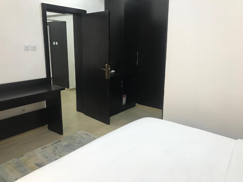 Postel nebo postele na pokoji v ubytování Hotel Capitol
