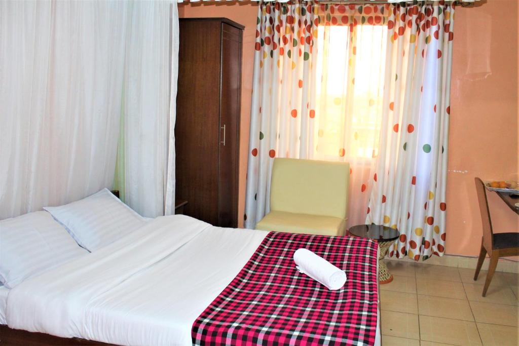 Voodi või voodid majutusasutuse Hotel Kepler toas