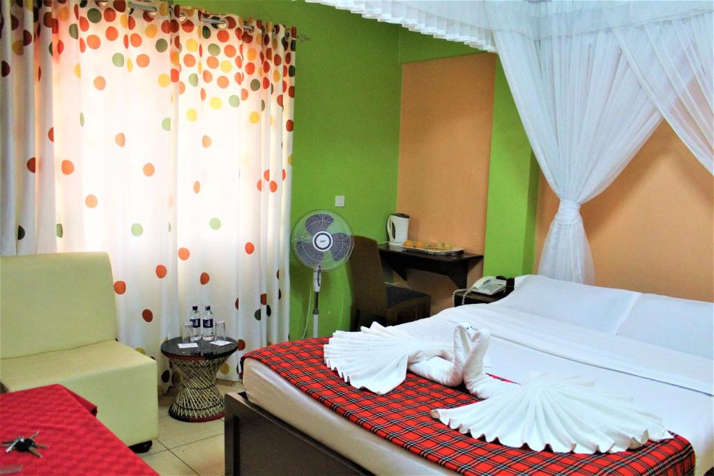 Voodi või voodid majutusasutuse Hotel Kepler toas