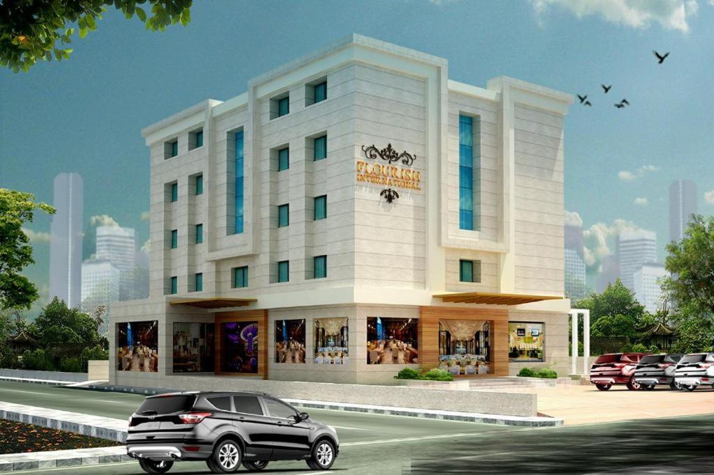 a rendering of a building with a car in front at HOTEL FLOURISH INTERNATIONAL in Ahmedabad