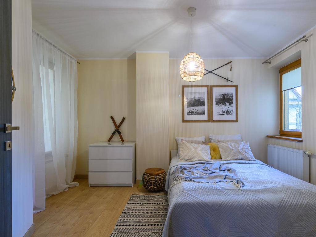 Posteľ alebo postele v izbe v ubytovaní VisitZakopane - Queen Apartment