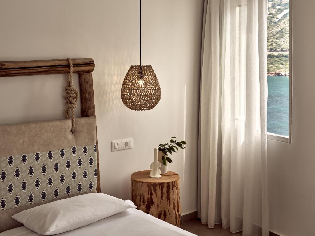 Postel nebo postele na pokoji v ubytování Troulis Apart-Hotel