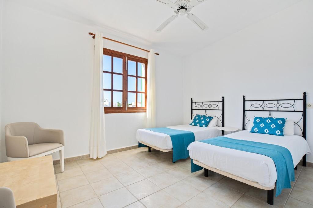 Postel nebo postele na pokoji v ubytování Villa Casa Angel