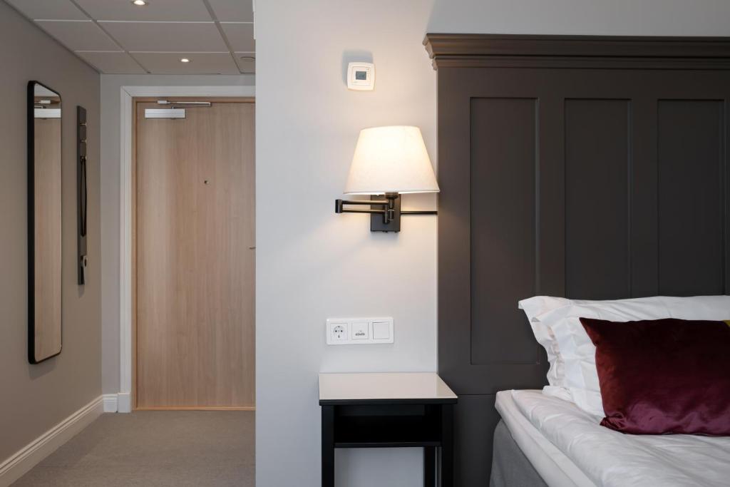 Postel nebo postele na pokoji v ubytování Elite Stora Hotellet