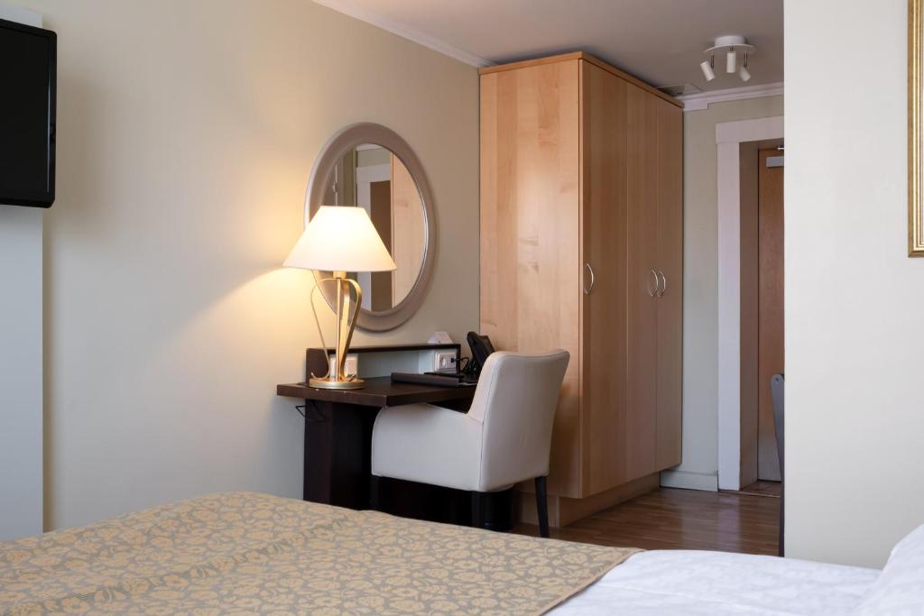 Postel nebo postele na pokoji v ubytování Elite Stora Hotellet