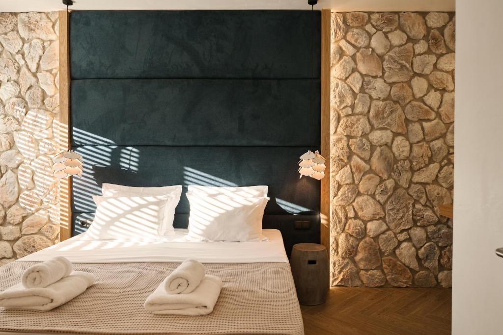 Postel nebo postele na pokoji v ubytování White Nest Villas